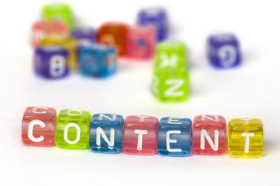 Text Content on colorful wooden cubes over white
